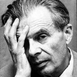 Aldous Huxley striking the famous one-eye pose we see so often in these circles.